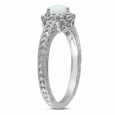 5.0mm Opal Berbentuk Hati dan 1/8 CT. T.W. Cincin Bingkai Berlian dalam Perak Sterling